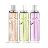 Packshot del bundle di layering starlicious the yummy swirl con Pineapple Musk, Pistachio Praline e Berry Licorice: flaconi in vetro con una stella cadente intagliata, le cui sfaccettature brillano sotto un elegante tappo argentato.